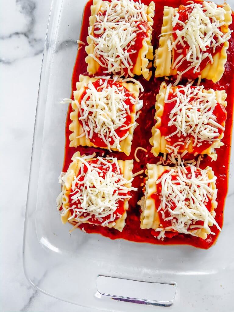 5 Delicious Ways to Use Pumpkin Pasta Sauce This Fall; lasagna roll ups in a 9x13 dish