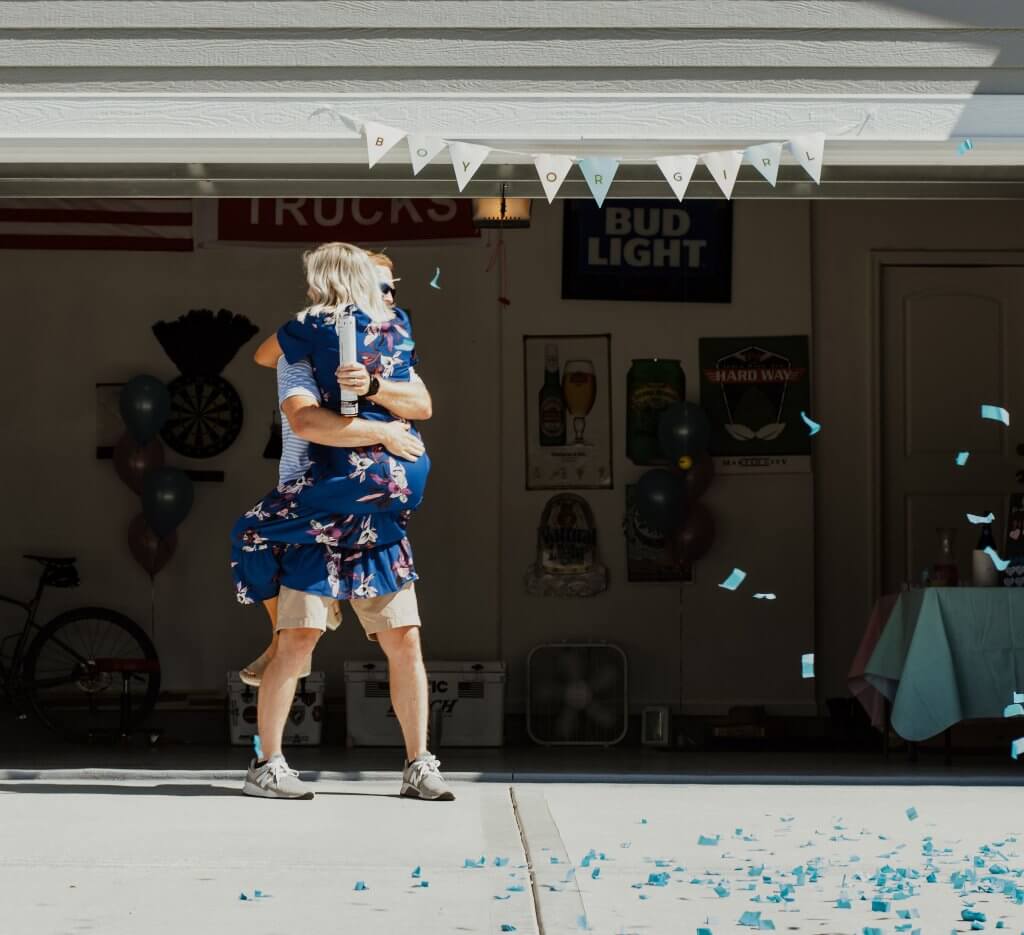 gender reveal party ideas; baby boy, pregnancy - reaction photo