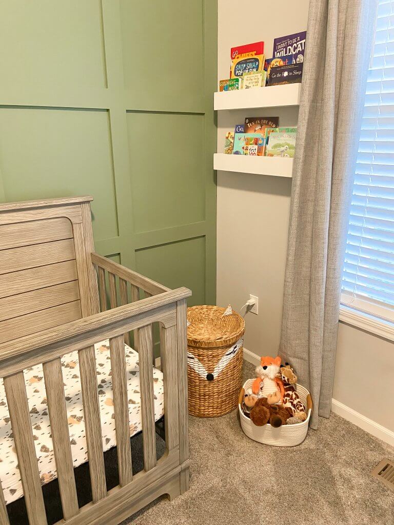 baby boy nursery decor; bookshelves, stuffed animals 