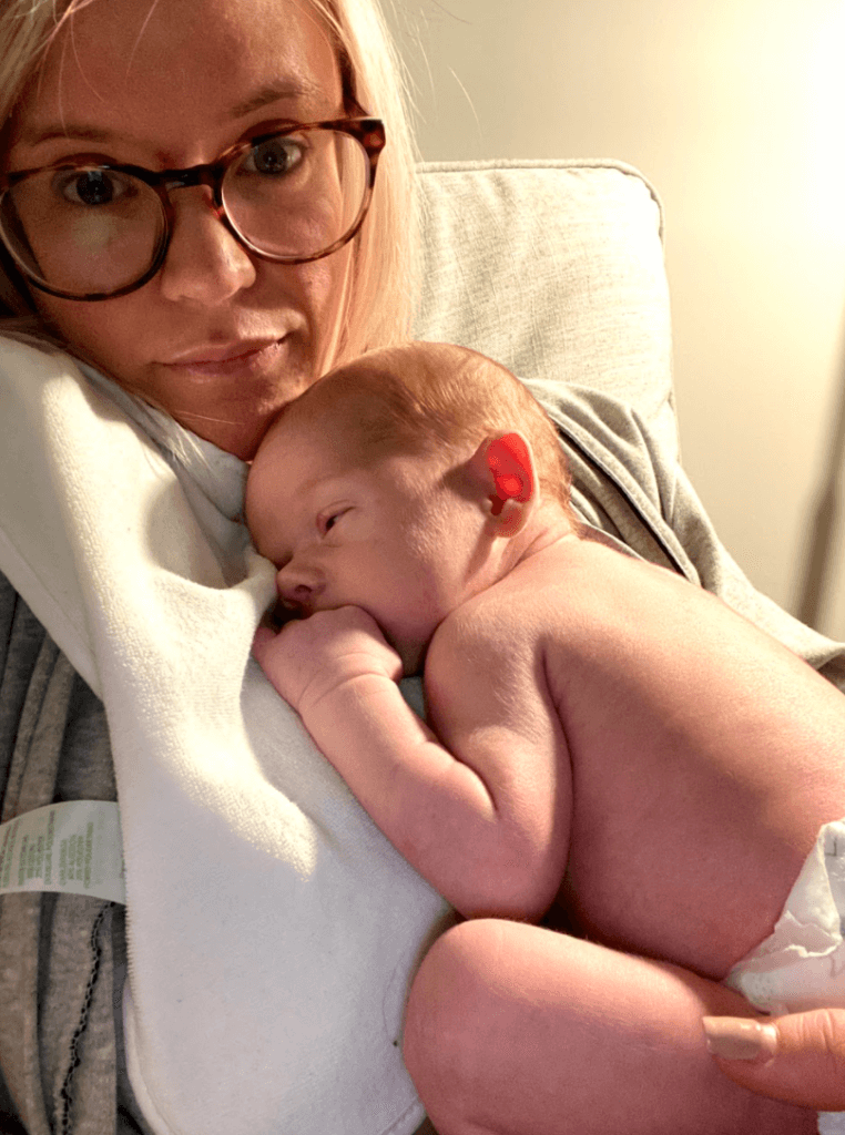 how to live a healthy balanced life as a mom ; mom with sleepy newborn on her chest 