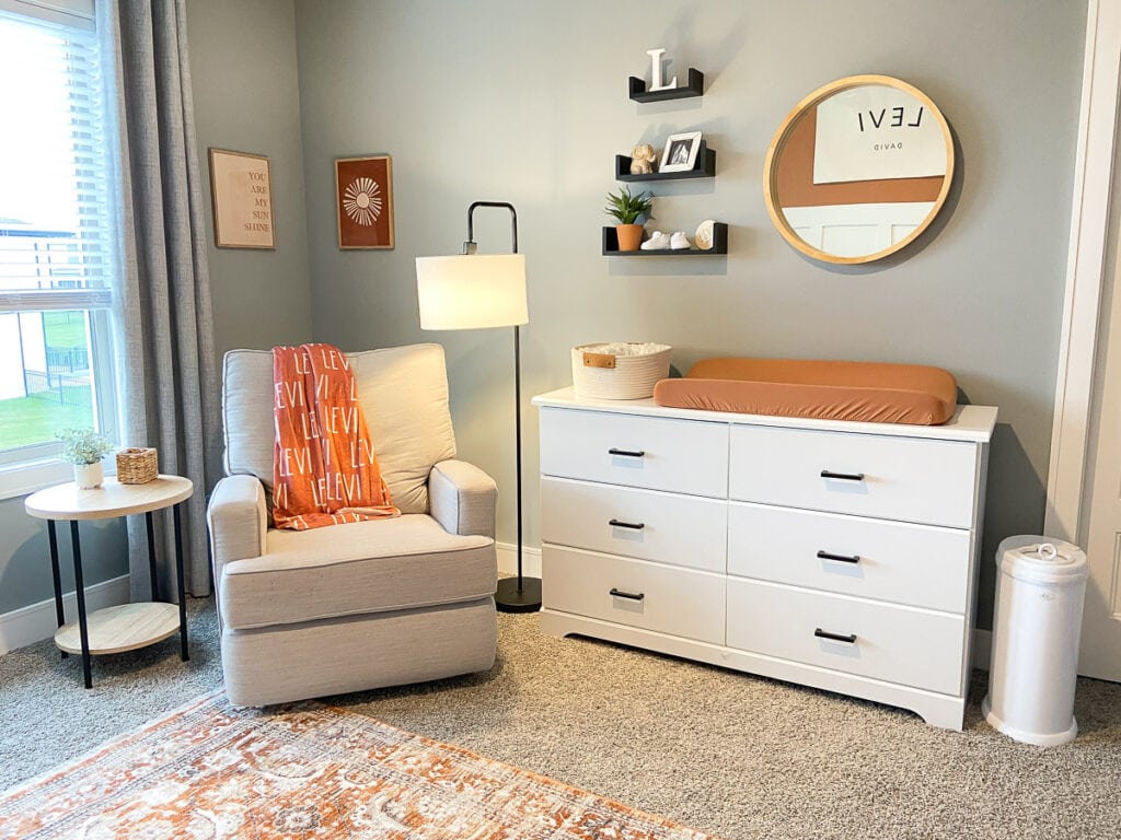 baby boy nursery decor; decorating inspiration, nursery with orange accents; boho baby boy room